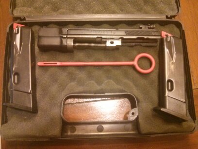 cz 75 mas el kit de 22. muy cuidada y con pocos tiros .... 01