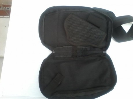 vendo funda rinonera para pistola y un cargador interior, dos departamentos extrior para otro cargador 02