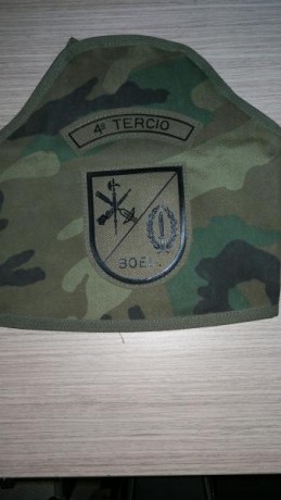 Brazalete para uniforme mimetizado boscoso de la Bandera de Operaciones Especiales de la Legión.

Pieza 00