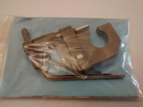 Vendo corrector para punto de mira de rifles Mauser y supongo que también para algunos más.

Está sin 01