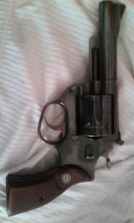 Cambio pistola astra 9 corto y revolver astra 960 por arma larga rifle o monotiro las armas están en lleida 10
