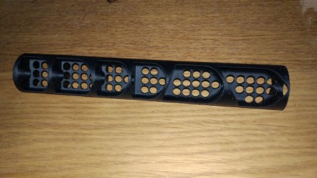 Diseño de bafle largo para usar con el prolongador de el moderador ,fabricado en 3d y ABS .
Diseño de 02