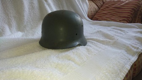 Hola

Pongo a la venta un casco de origen alemán traído a España por la Legión Condor.

Presenta los marcajes 01