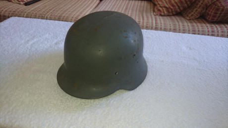 Hola

Pongo a la venta un casco de origen alemán traído a España por la Legión Condor.

Presenta los marcajes 00