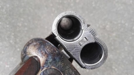 Buenas. Hace poco cayo en mis manos esta escopeta. Es una Arrieta y Cia con la inscripcion en un cañon 00