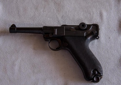 estimados, 
en mis manos llego una pistola luger de 1913 fabricante DWM 9MM original. numero de la pieza 42