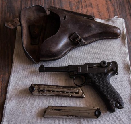 estimados, 
en mis manos llego una pistola luger de 1913 fabricante DWM 9MM original. numero de la pieza 50