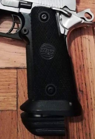 Hola si a alguien le sobra un cargador de 120mm y calibre 38/9mm de SPS o STI y le interesa el trueque, 00
