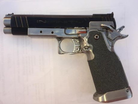 Vendo pistola INFINITY del calibre 40. De corredera mas corta que el cañon para minimizar la reelevacion 01