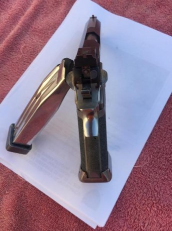 Hola vendo pistola INFINITY del calibre 40. Es de 5 pulgadas el cañon. La corredera es de 4,5 pulgadas, 02