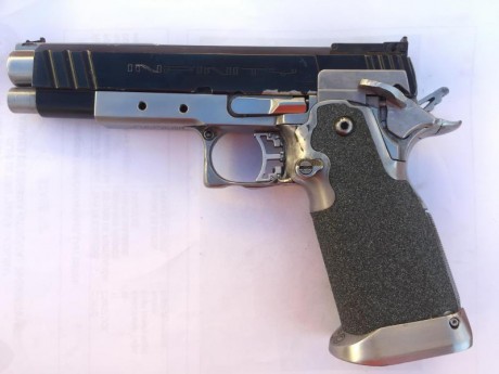 Hola vendo pistola INFINITY del calibre 40. Es de 5 pulgadas el cañon. La corredera es de 4,5 pulgadas, 01