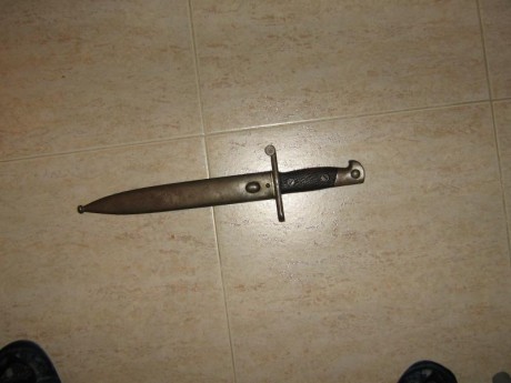 busco bayoneta corta mauser corta modelo coruña oviedo, de las usadas en guerra , en buen estado y completa 21
