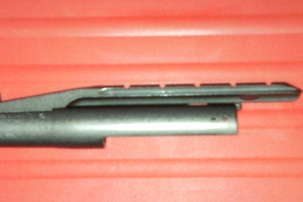Mi semiautomatica winchester sx3 tiene un cañon rayado que lleva incorporado un carril para colocar un 02