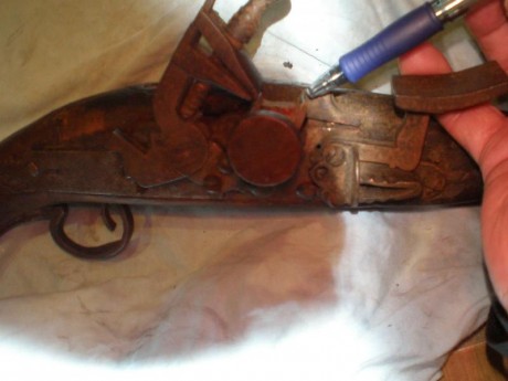 Pues eso, ha salido del trastero, y no puedo identificar solo he visto un rifle con el mismo mecanismo 22