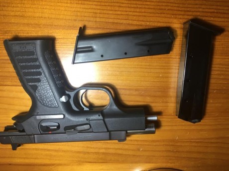 Se vende pistola sps compac plus II del 9 mm con dos cargadores , el disparador va fino, con muy poco 02