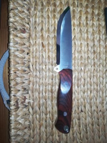 Vendo cuchillo ibex filo scandi acero n690 mango en cocobolo y separadores rojos nuevo de vitrina su precio 01