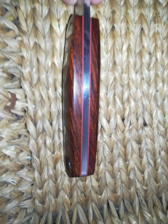 Vendo cuchillo ibex filo scandi acero n690 mango en cocobolo y separadores rojos nuevo de vitrina su precio 00
