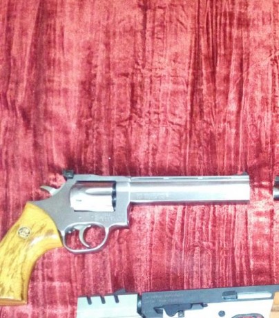 Por motivos de espacio y otros proyectos pongo en venta mi DAN wesson modelo 715 Inox de 6" cal357 00