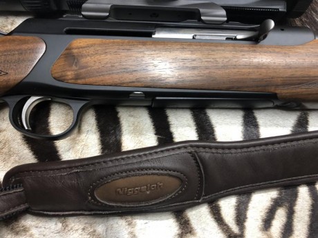 Vendo SAUER s303 classic madera grado 2 seleccionada entre varios rifles, con freno de boca dual break 10
