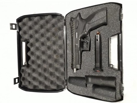 Vendo pistola seminueva tiene unos 500 disparos,ideal para IPSC producción,4 lomos intercambiables, punto 02