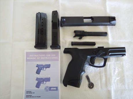 Parecida a Glock, pero va mejor en la mano por lo diseño anatomico de cacha. Cañon espejo. No da problemas 02
