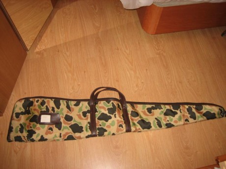 Hola.  Rifle semiautomático, es el de cañón largo con freno de boca calibre 30/06, dos cargadores de 2 41