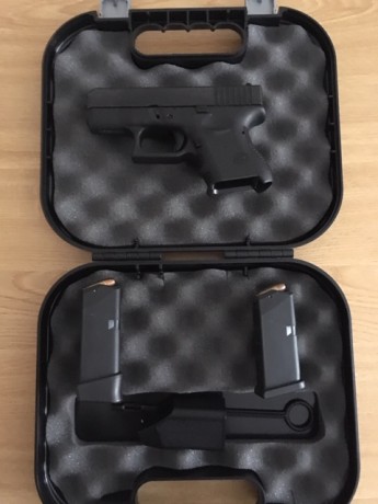 Pistola Glook 26,calibre 9mm Parabelum,compacta,perfectisimo estado,se entrega con 2 cargadores,funda 01