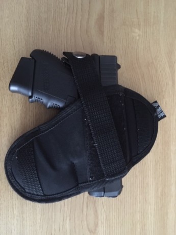Pistola Glook 26,calibre 9mm Parabelum,compacta,perfectisimo estado,se entrega con 2 cargadores,funda 00