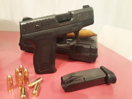 Se vende pistola de la  marca TAURUS modelo Millennium cal. 9 Pb, compacta, guiada en A ,( MMEE) el arma 02