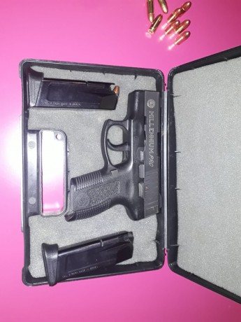 Se vende pistola de la  marca TAURUS modelo Millennium cal. 9 Pb, compacta, guiada en A ,( MMEE) el arma 32