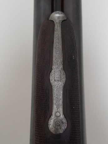 Exclusiva escopeta inglesa de la prestigiosa casa Joseph Lang. Es el modelo  "underlever". Año 12