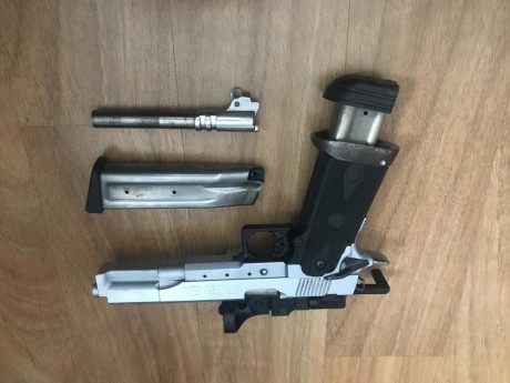 Vendo pistola SPS Open, con 2 cañones, el original del 38 S.Auto y uno nuevo con apenas 300 disparos del 00