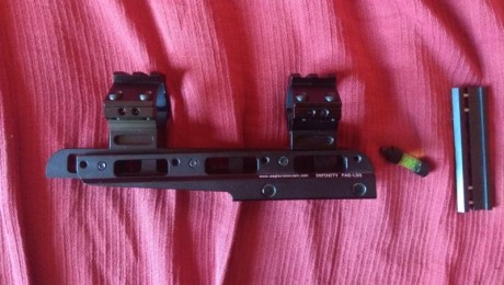 Hola, vendo rail con anillas incorporadas INFINITY FAE-L50 de eaglevisioncam, el rail es ajustable en 00