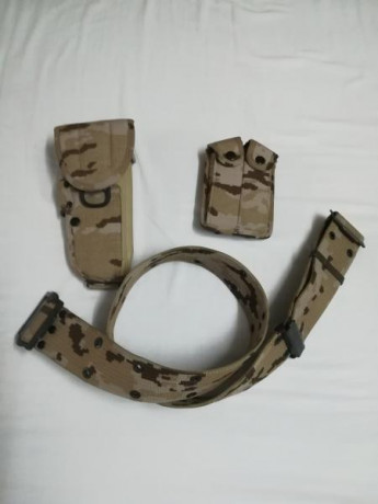 Vendo conjunto cinturón, funda y portacagador doble, tipo militar árido, es replica pero esta nuevo, la 00