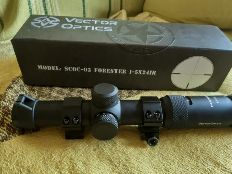 Hola cambio visor de batida Vector Optics  1-5x24 con reticula iluminada con las monturas completamente 00