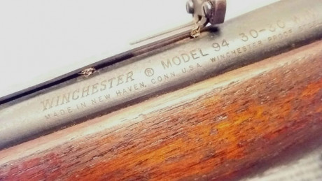 Hola un amigo cazador tiene este winchester modelo 94 calibre 30-30 y quiere saber su año de fabricación 00