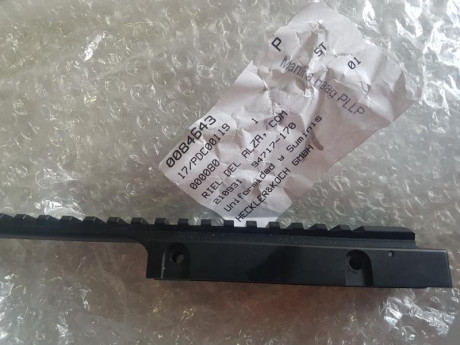 Hola, por dejar de usar el G36 vendo:

 Un Rail superior picatiny original de HK, con miras abatibles, 111