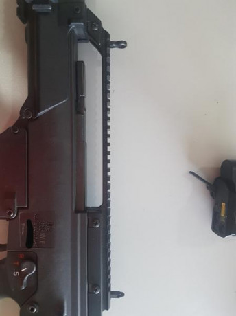 Hola, por dejar de usar el G36 vendo:

 Un Rail superior picatiny original de HK, con miras abatibles, 120