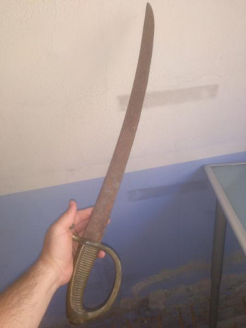 Hola, tengo un sable antiguo, creo que es de infantería, su antiguo dueño decía que era de la guerra de 00