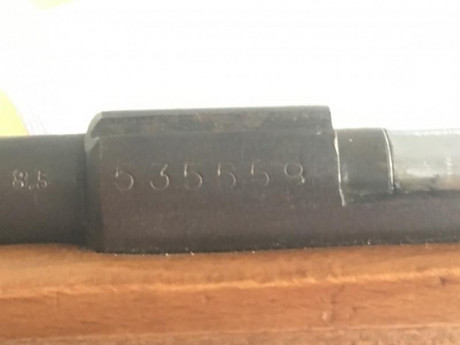 Estoy buscando información de esta arma, fabricante,año de fabricación y tipo de municion 00