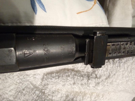 Rifle mozin con culata aty y monturas latetales para visor de pulgada. 70