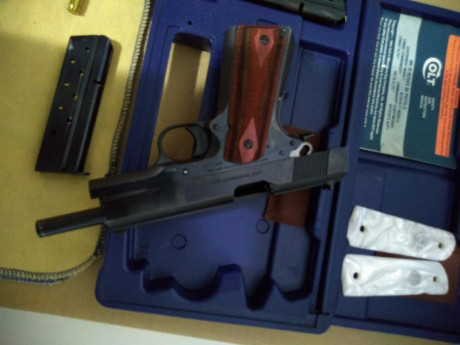 "RESERVADA"  pistola Colt  MK-IV en cal. 38 super auto.
Su estado es excelente, se incluye dos 01