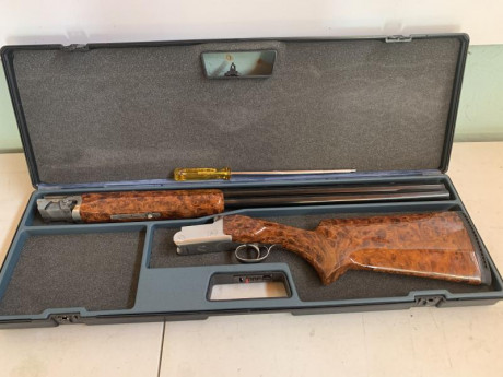 Hola buenas vendo una escopeta del 12 para plato con cañón de 76 cm mono gatillo expulsora con maletín 02