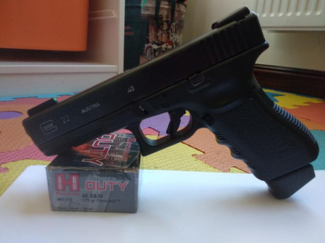 Vendo Glock modelo 22 en calibre 40 SW, de tercera generación, con sistema de amortiguación DPM, incluye 00