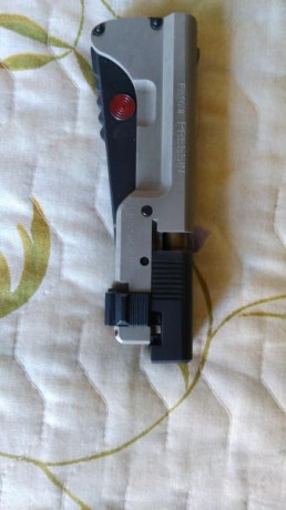 Vendo Pistola PRESSIN 7.65 en muy buen estado, edición limitada y numerada, con munición y funda. La tengo 02