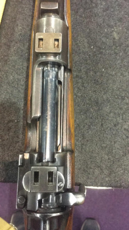 Hola a todos. 
Un conocido tiene un fusil, según el un K98, pero con ese marcaje que parece del ejército 01