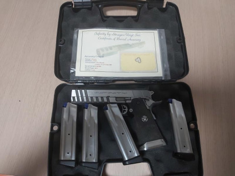 Se vende infinity hybrid de 9mm por falta de uso y de tiempo, lleva guardada mas de 2 años

va acompaña 02
