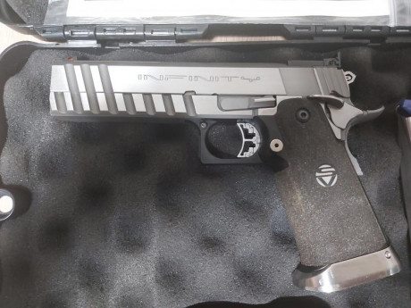 Se vende infinity hybrid de 9mm por falta de uso y de tiempo, lleva guardada mas de 2 años

va acompaña 01