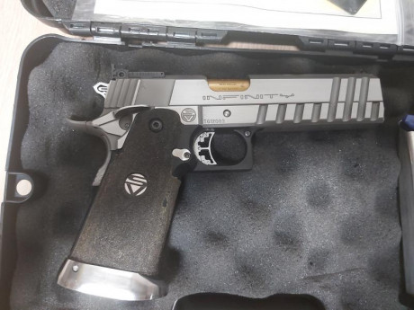 Se vende infinity hybrid de 9mm por falta de uso y de tiempo, lleva guardada mas de 2 años

va acompaña 00