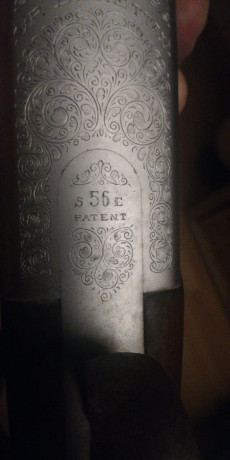 Un compañero tiene una superpuesta beretta expulsora, con selector, tendra unos 40 años y lleva grabado: 50